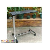 Overbed table with stand and wheels