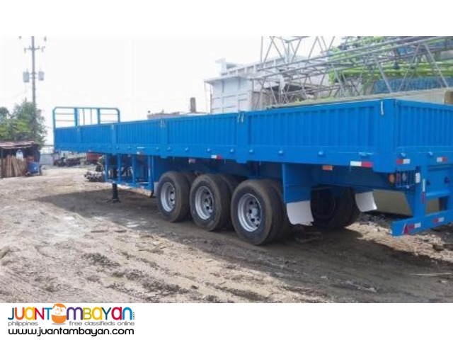 Flatbed with sidings Tri-axle Flatbed with sidings Tri-axle