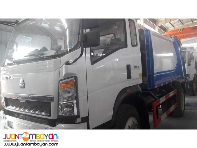 Sinotruk Homan H3 Garbage Compactor.