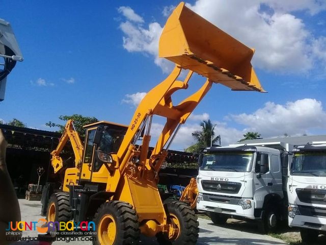 25-30 Backhoe loader