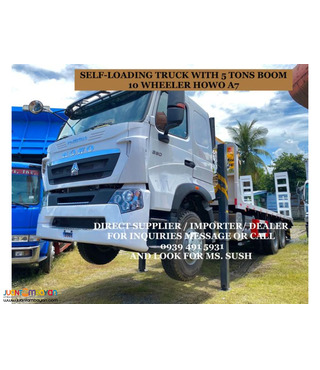 SELF LOADING TRUCK with 5 tons boom sinotruk howo a7