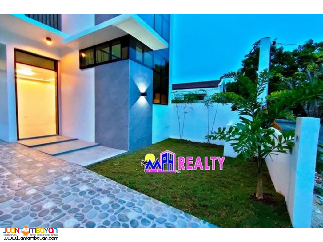MOLAVE HIGHLANDS - FOR SALE 4 BR HOUSE IN CONSOLACION, CEBU