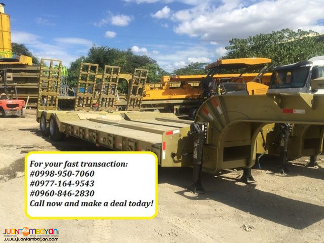 11. TWO AXLE LOWBED SEMI TRAILER