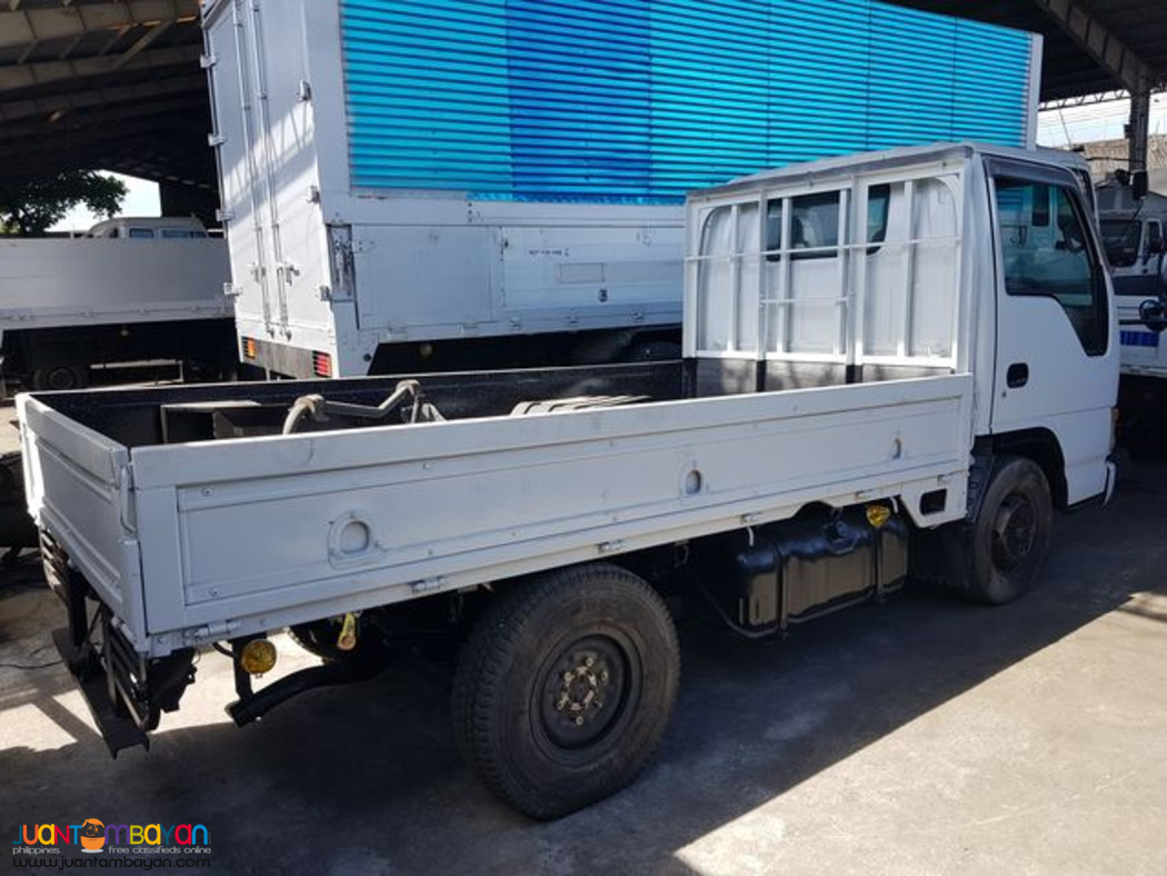 Dropside Cargo Truck ISUZU Elf - 4 Wheeler
