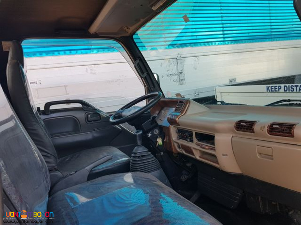 Dropside Cargo Truck ISUZU Elf - 4 Wheeler