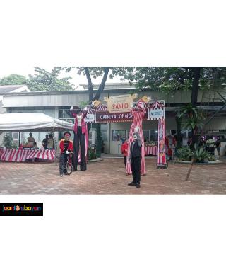 circus carnival Street performers, stilts, juggler, unicycle