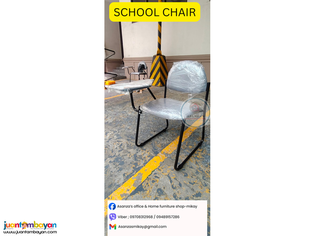 school chair with writing tab