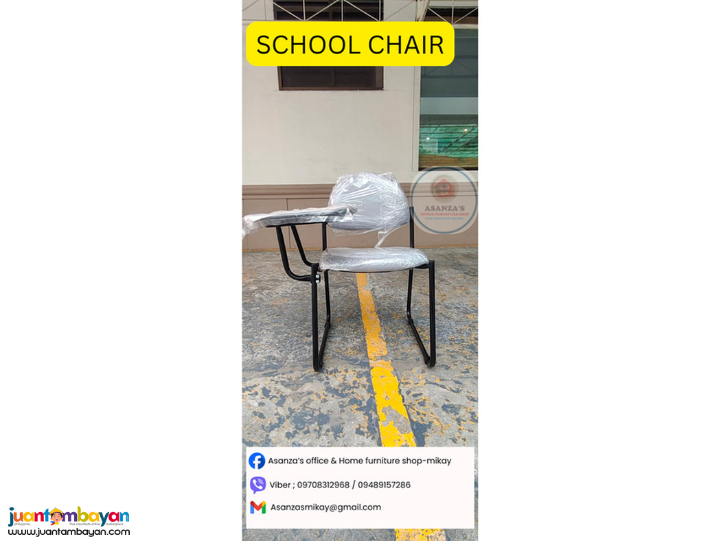 school chair with writing tab