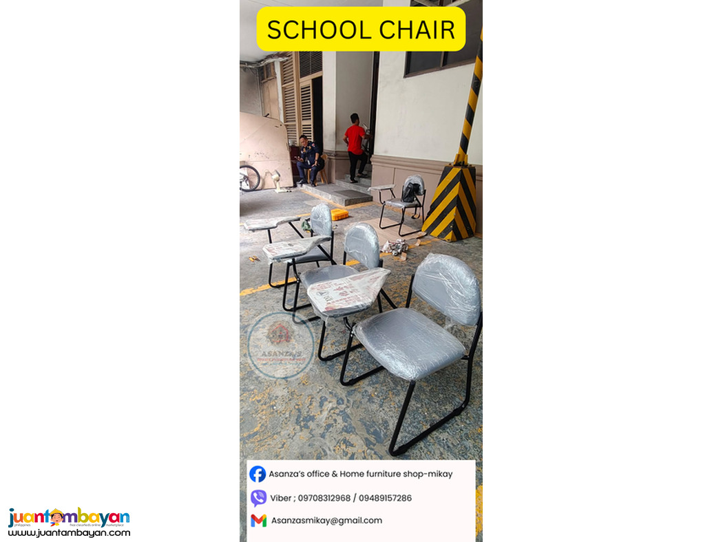 school chair with writing tab