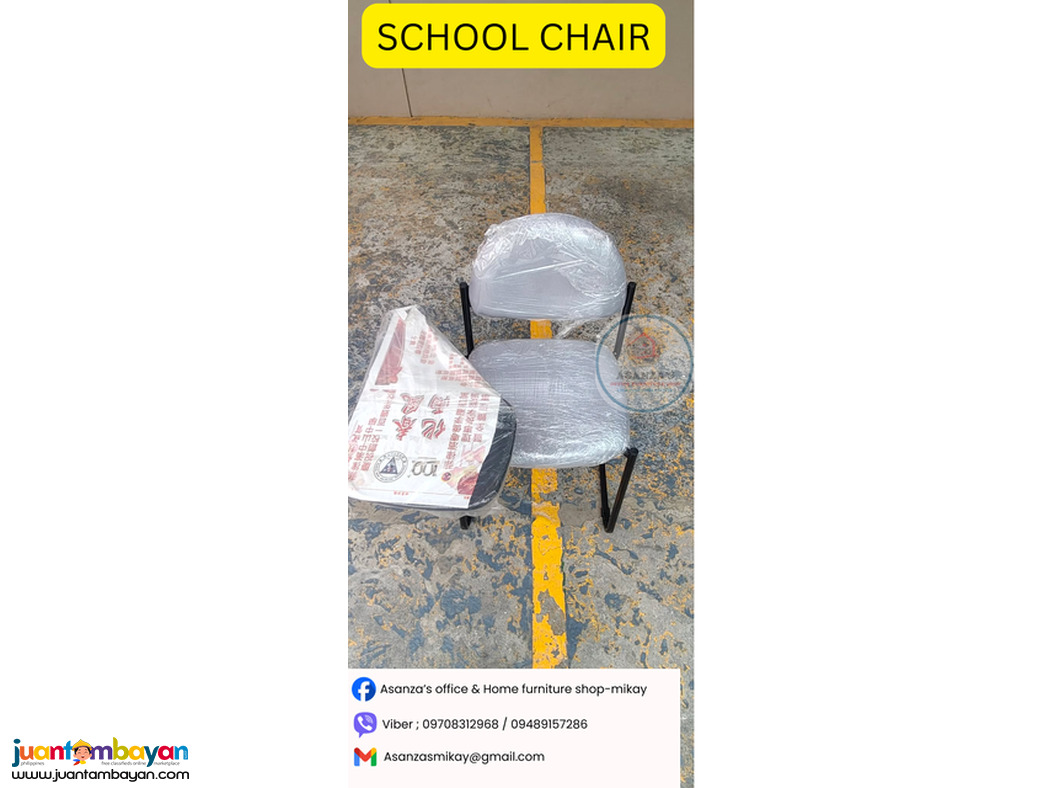 school chair with writing tab
