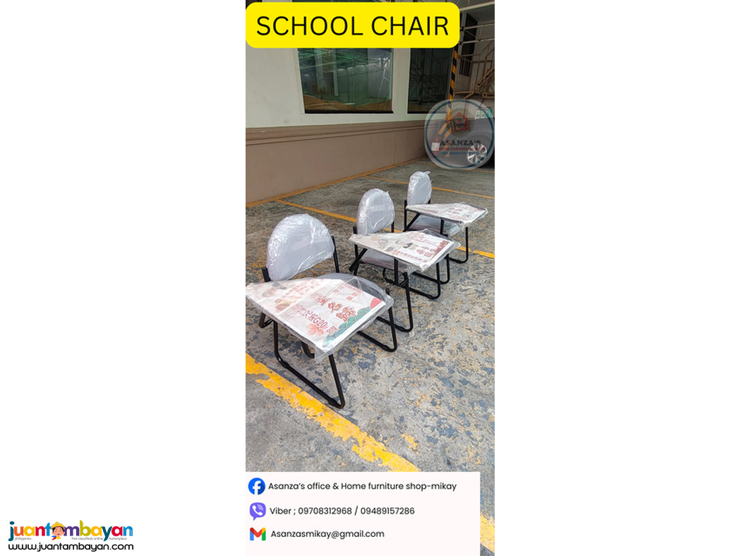school chair with writing tab