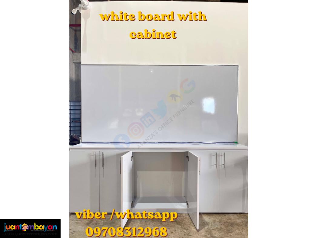 white board with cabinet