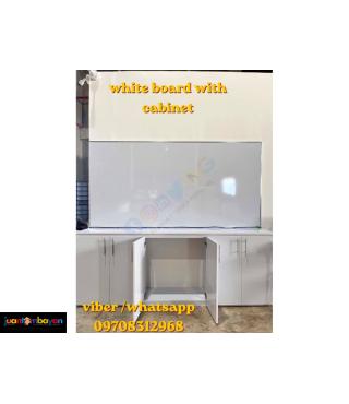 white board with cabinet