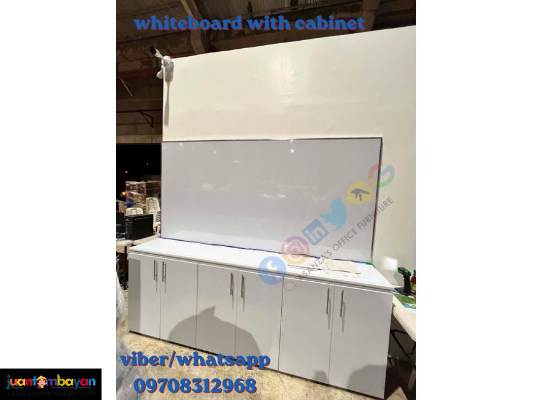 white board with cabinet