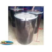 Empty metal drum with cover